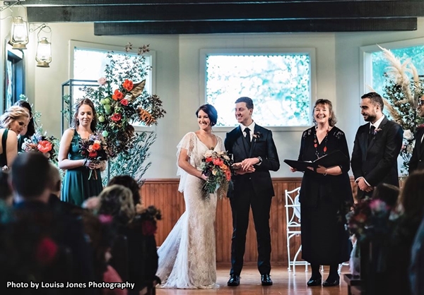 photo of wedding party and celebrant